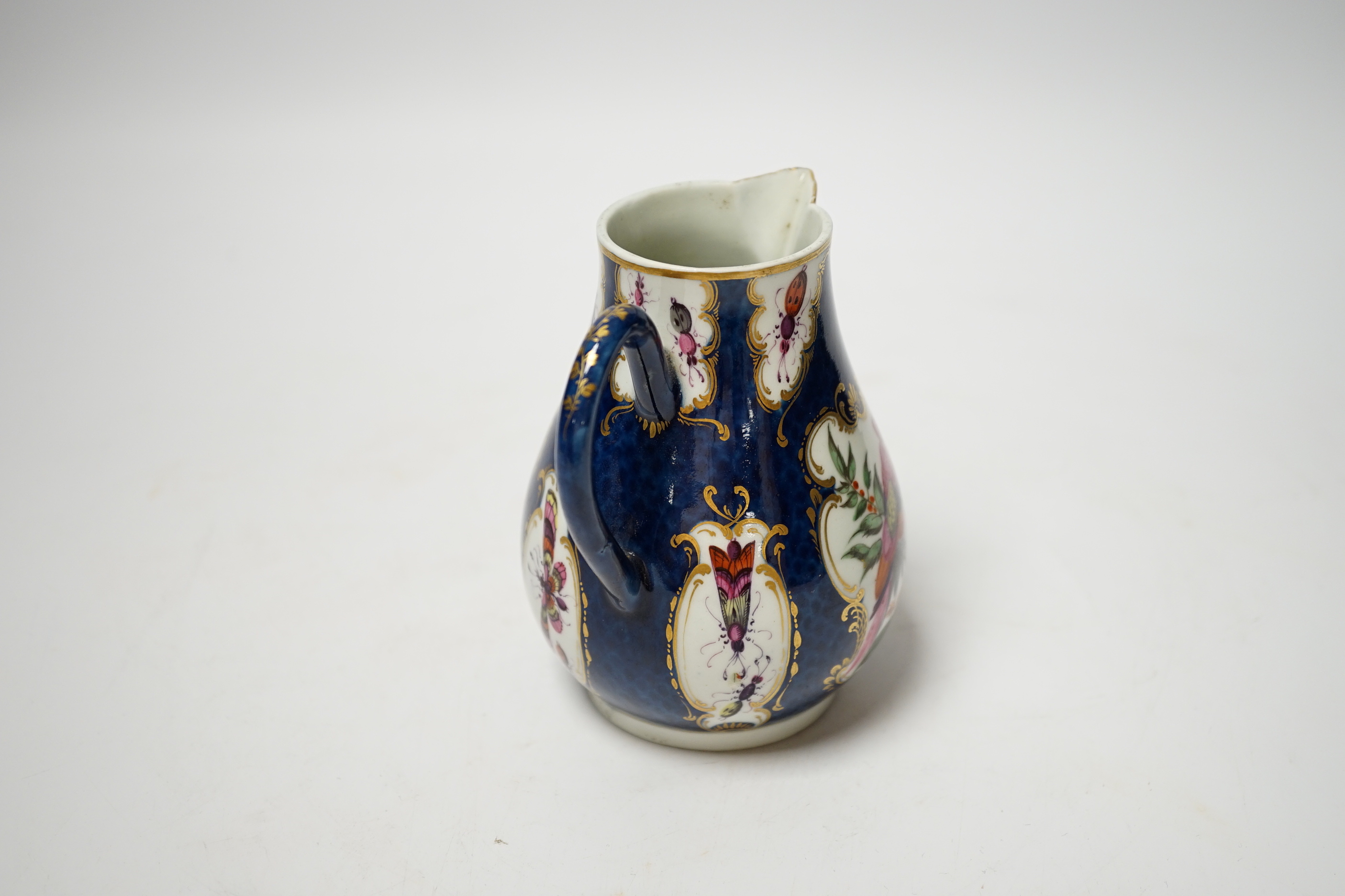 An 18th century Worcester blue scale jug, 11cm